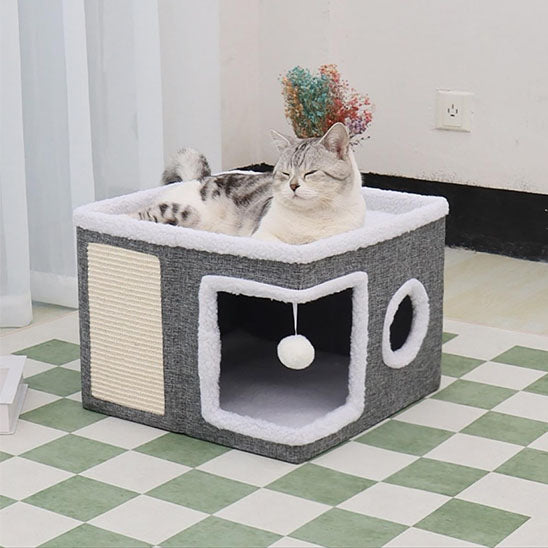 chat repose dessus niche à chat villa féline